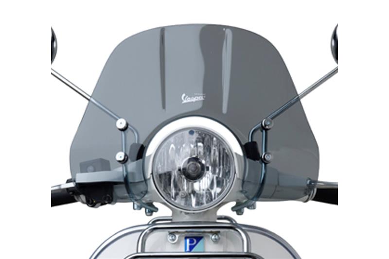 Original Piaggio smoked mini-windshield complete with attachments for Vespa PX