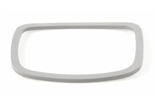 Guarnizione trapezoidale grigio chiaro 61x51 mm per la sede del contachilometri Vespa 125 VNB3, VNB4, VNB5 e VNB6.