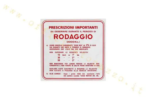 Adesivo rosso Rodaggio 2% per Vespa 3 marce, indicato per 125 VNB1T-VNB4T e 150 VBA1T. Applicazione sul retro dello scudo.