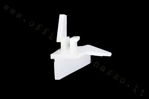 Deflettore olio interno in plastica per motori Vespa PX, T5 e Cosa, confrontabile con Piaggio 146129. Verificare forma e fissaggio.