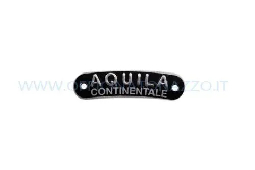Targhetta Aquila Continentale in metallo per sella Vespa, formato nominale 17 x 64 mm e fissaggio a due rivetti.