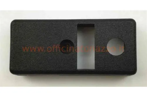 Coperchio devioluci GRABOR nero per Vespa PX prima serie con frecce. Ricambio della sola calotta esterna, riferimento 163337.