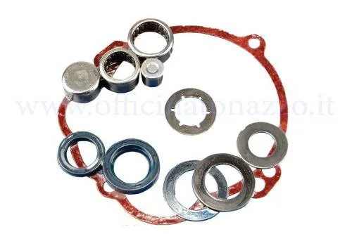 Kit CIF 10058-K per mozzo posteriore monomarcia di Piaggio Ciao, Si, Bravo e Boxer: quattro rullini, due tenute, rondelle e guarnizione.