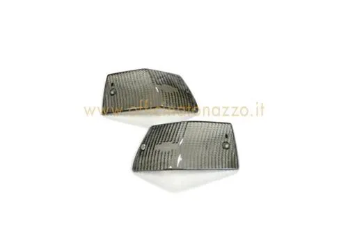 Set di quattro corpi luminosi fumè Bosatta per indicatori anteriori e posteriori di Vespa PX, PE e T5, nelle cilindrate compatibili.