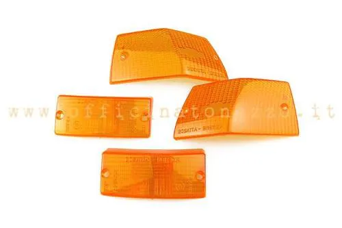 Quattro lenti SIEM arancioni per frecce anteriori e posteriori Vespa PX, PE e T5; riferimenti Piaggio 185976, 185977, 185978 e 185979.