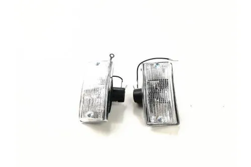 Par de intermitentes delanteros con cristal blanco y marco cromado para Vespa PX - PE - T5