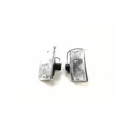 Coppia indicatori di direzione anteriori con vetro bianco e cornice cromata per Vespa PX - PE - T5