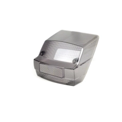 Corpo luminoso posteriore fumè per Vespa PX Arcobaleno 125/150 e P 200 E, serie 1985-2000. Confrontare sagoma e fissaggi prima del montaggio.