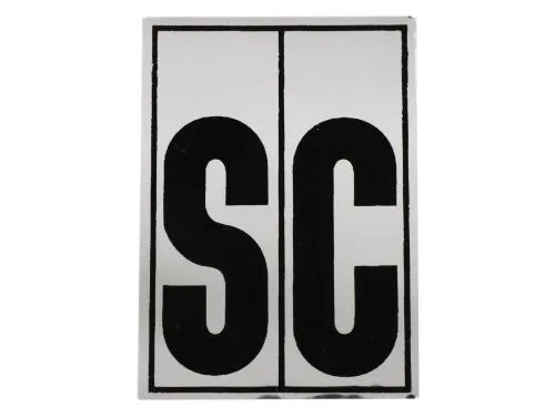 Targhetta adesiva con grafica SC per il parafango posteriore del ciclomotore Piaggio Ciao SC, destinata al ripristino della finitura identificativa.